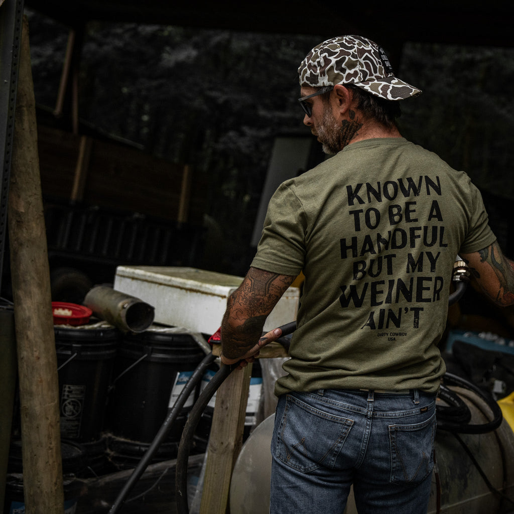 Known To Be A Handful. But My Weiner Ain't  Men's T-Shirt