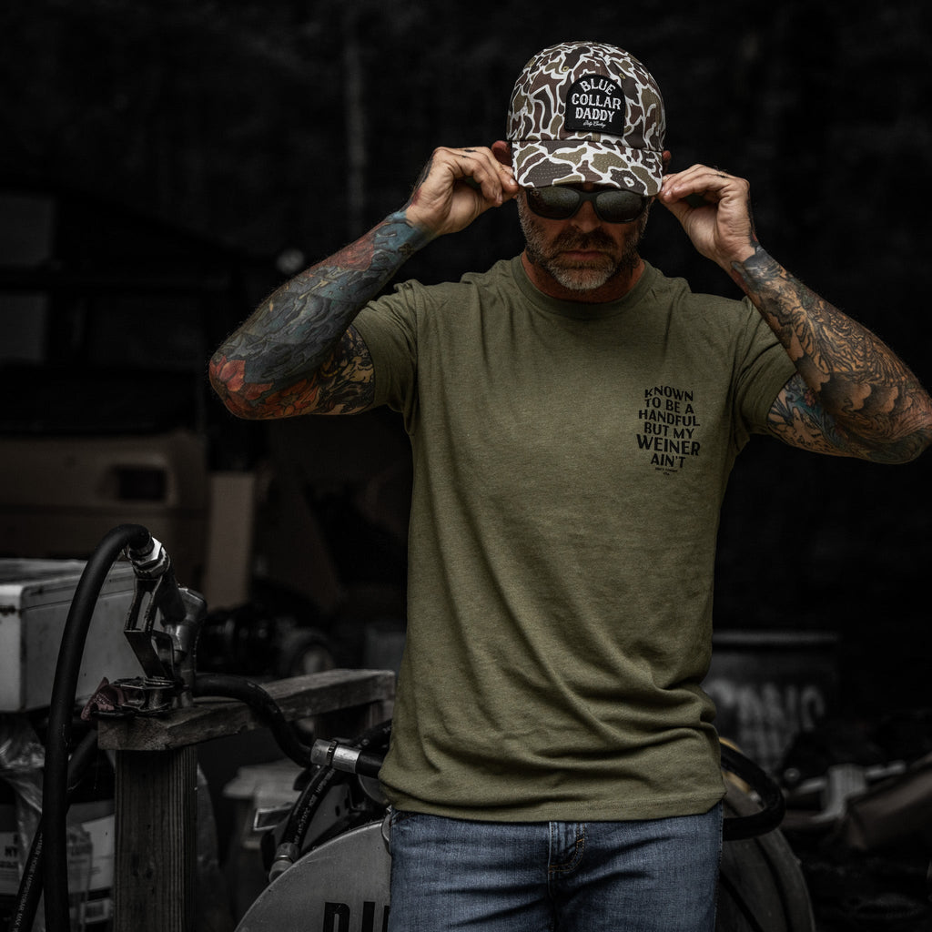 Known To Be A Handful. But My Weiner Ain't  Men's T-Shirt