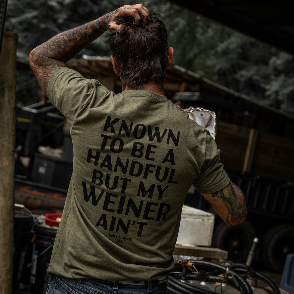 Known To Be A Handful. But My Weiner Ain't  Men's T-Shirt